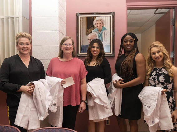 DNP students prepare to walk into the UArizona College of Nursing Doctor of Nursing Practice white coat ceremony.