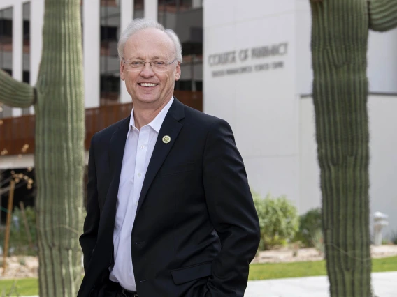 College of Pharmacy Dean Rick G. Schnellmann, PhD, stands in front of the renovated and expanded Skaggs Pharmaceutical Sciences Center. 