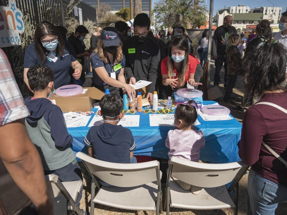 University of Arizona R. Ken Coit College of Pharmacy students teach children about sun safety during the recent Family SciFest at Children's Museum Tucson.