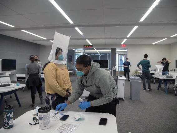 College of Medicine – Tucson students during different phases of their N95 mask fittings.