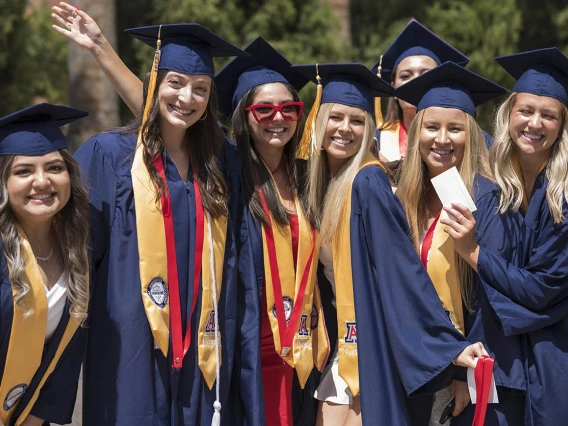 Some of the 49 College of Nursing 2022 summer graduates from the Bachelor of Science in Nursing Integrative Health Pathway program celebrate the completion of their degrees.