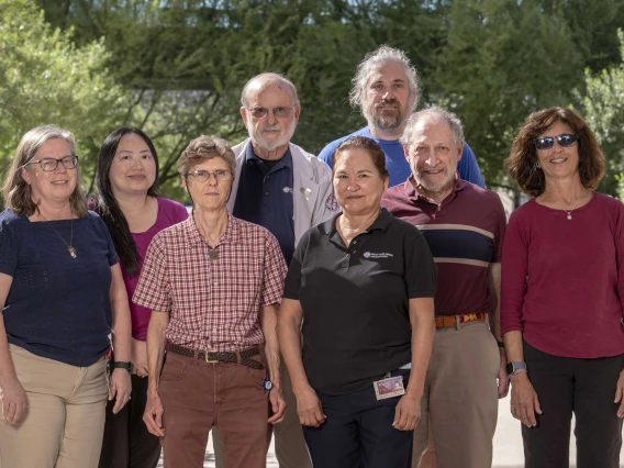 Team members of the Valley Fever Center for Excellence at the University of Arizona College of Medicine – Tucson pose for a portrait outside.