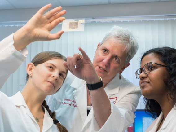 Research by Meredith Hay, PhD (center), professor of physiology, is using a $5.7 million NIH grant to develop a therapeutic drug for vascular cognitive impairment and vascular dementia.