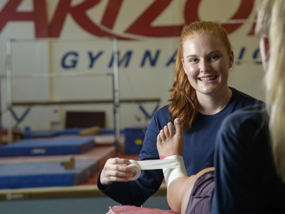 In addition to her role as an undergraduate research assistant, Mikayla Campagne works as an athletic training technician for the UArizona women’s gymnastics team. 