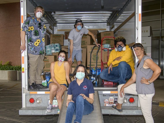 On June 5 Margaret Briehl, PhD, Maria Lluria-Prevatt, PhD, Sofia Prevatt, UArizona alumn Meucci Ilunga, Dennis Ray and Matthew Prevatt helped load a truck to transport donations from the Cancer Center to the Navajo Nation.