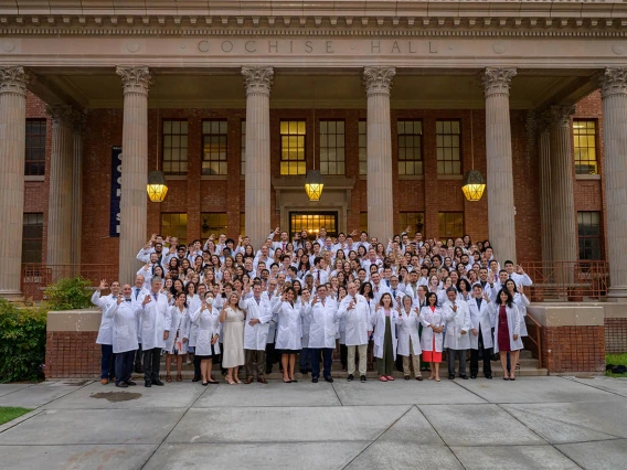 Members of the UArizona College of Medicine – Tucson Class of 2026 and faculty members gather for a photo after the white coat ceremony on July 29.