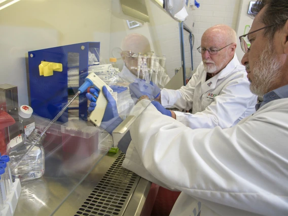 Michael Badowski, PhD, and David T. Harris, PhD, assemble sample collection kits in Harris’ lab in the Health Sciences Biorepository.