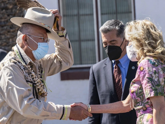 Jerry Carlyle, vice chairman of the San Xavier District, tips his hat as he greets first lady Jill Biden, EdD, at the San Xavier Health Center in the San Xavier District of the Tohono O'odham Nation on March 8, 2022.