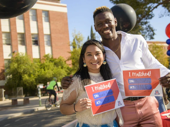 Naiby Rodriguez (left) matched at UC San Francisco while Caylan Moore matched with Yale during the UArizona College of Medicine – Tucson 2022 Match Day event.