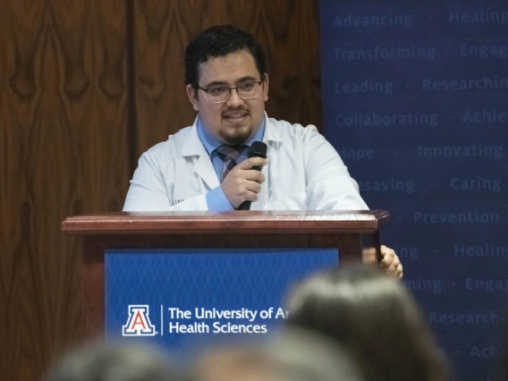 Primary Care Physician scholarship recipient Raymond Larez, MPH, speaks at the Tucson scholarship reception. 