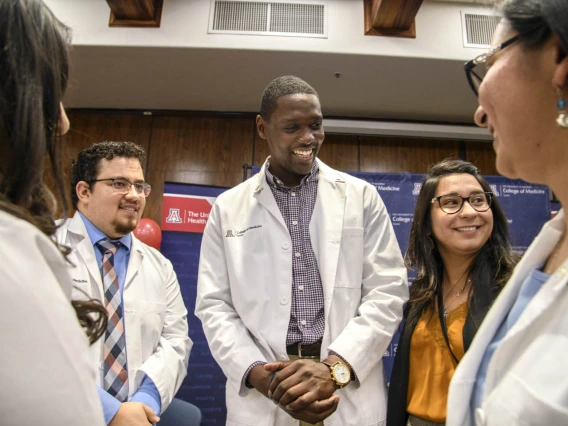 Tucson Primary Care Physician scholarship recipients Raymond Larez, MPH, and Caylan Moore