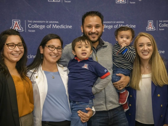 Primary Care Physician scholarship recipient Naiby Rodriguez with her family.