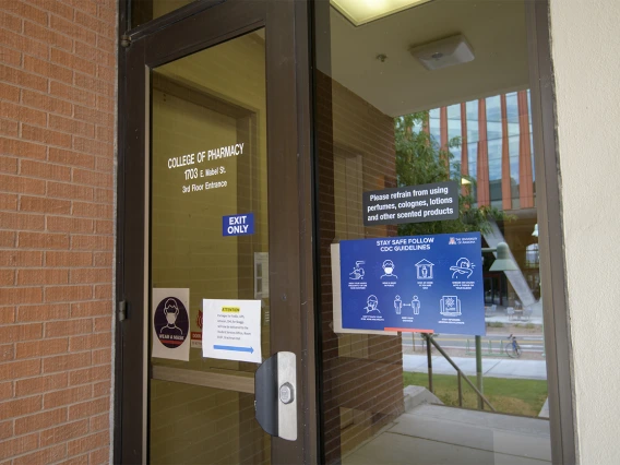 Signage reminds passersby to follow the CDC guidelines. 