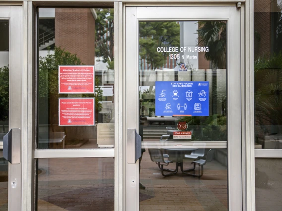 Across campus, signage reminds passersby to follow CDC safety guidelines for mitigating the transmission of diseases such as COVID-19.