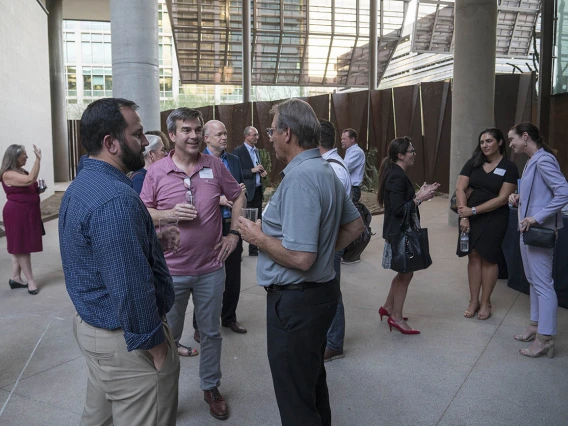 Attendees mingle after “Precision Health Care for All: The University of Arizona Health Sciences Center for Advanced Molecular and Immunological Therapies,” the first UArizona Health Sciences Tomorrow is Here Lecture Series presentation in Phoenix.