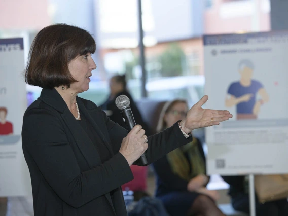 At the end of the town hall event, audience members had the opportunity to ask Dr. Dake questions about the Health Sciences strategic initiatives. Pictured here is Monica Kraft, MD, chair of the Department of Medicine.