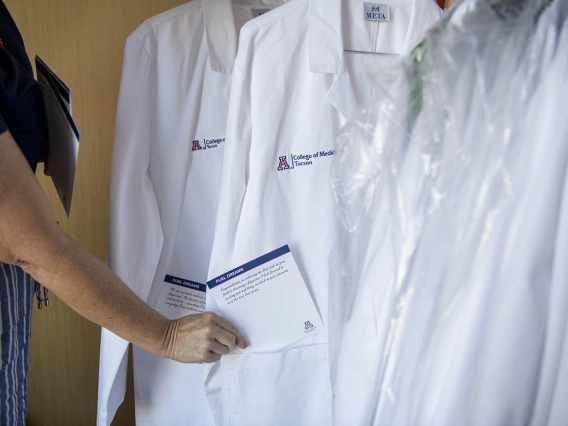 Each white coat presented has an inspirational note in the pocket written by faculty and staff.