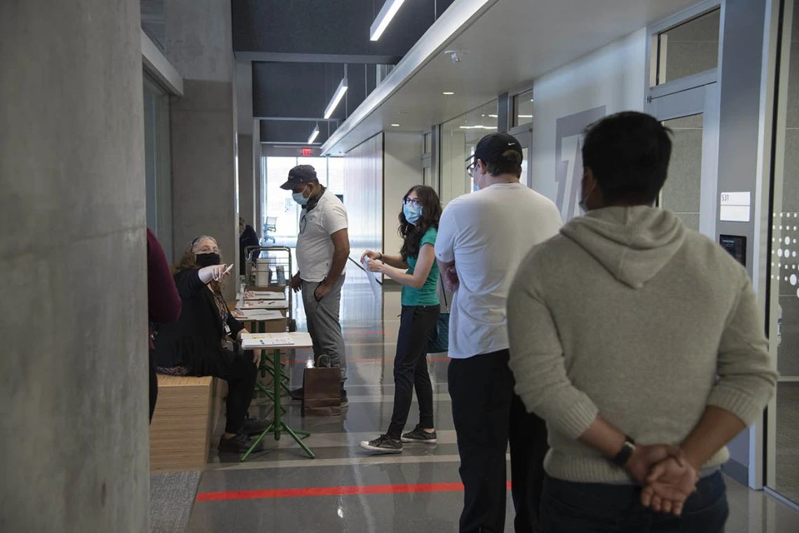 Second-year UArizona College of Medicine – Tucson students check in for their N95 mask fitting inside the Health Sciences Innovation Building. The students will soon begin clinical rotations in hospitals, possibly working directly with COVID-19 patients.