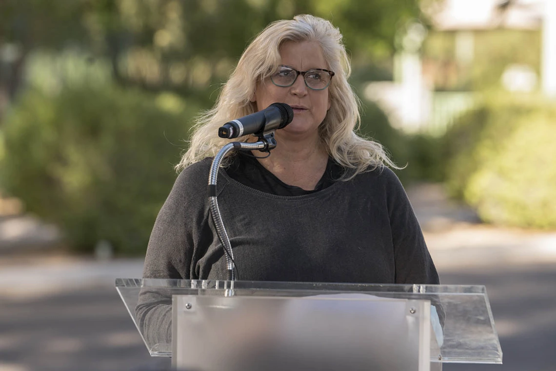 Family and Community Medicine’s Ann Mathias, DO, interim chair, vice chair for clinical affairs, and clinical assistant professor, speaks during the dedication ceremony celebrating the renaming of the Native American Research and Training Center to the Wassaja Carlos Montezuma Center for Native American Health.