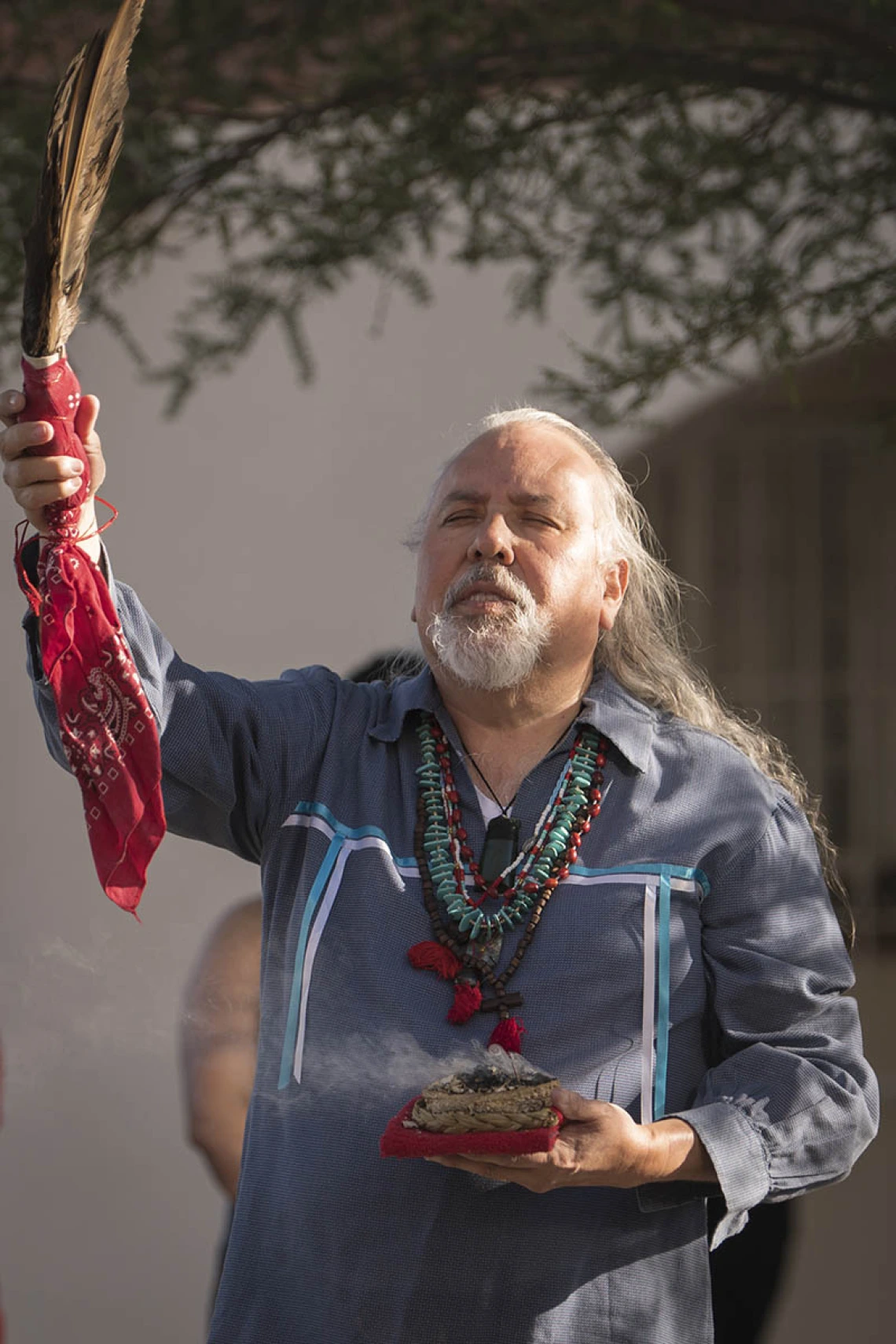 Carlos Gonzales, MD, performs a blessing ceremony using a prayer to the Seven Sacred Directions. This blessing involves recognizing the four cardinal points, plus above us (father sky), below us (mother Earth) and the center (the creator). 