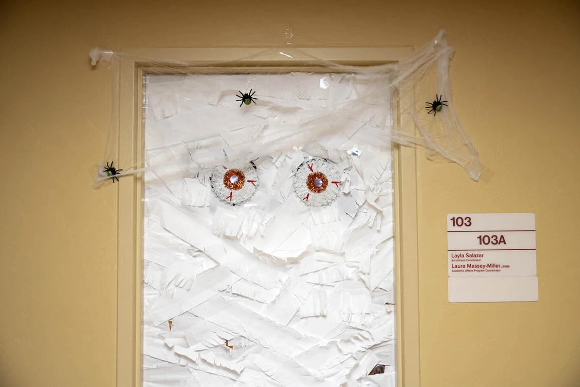 Is that the Abominable Snowman or a giant mummy peeking through this College of Nursing door? 