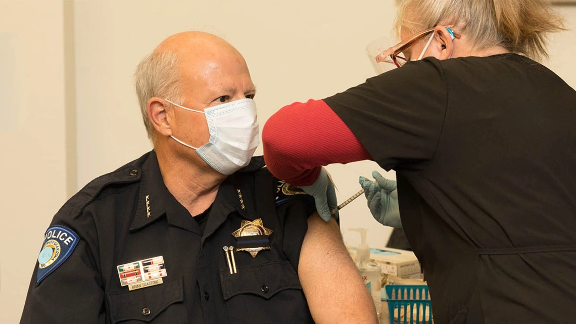 University of Arizona Police Chief Brian Seastone gets vaccinated at Campus Health.