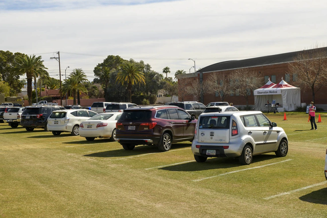 Vaccine recipients must stay in their cars at the vaccine site for an additional 15 minutes to monitor for any adverse reactions to the vaccine. 