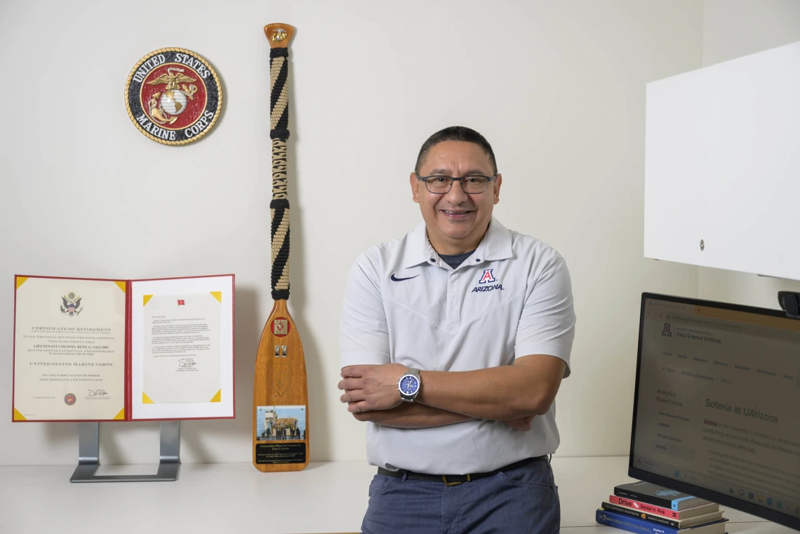 portrait of rudy salcido with military memorabelia