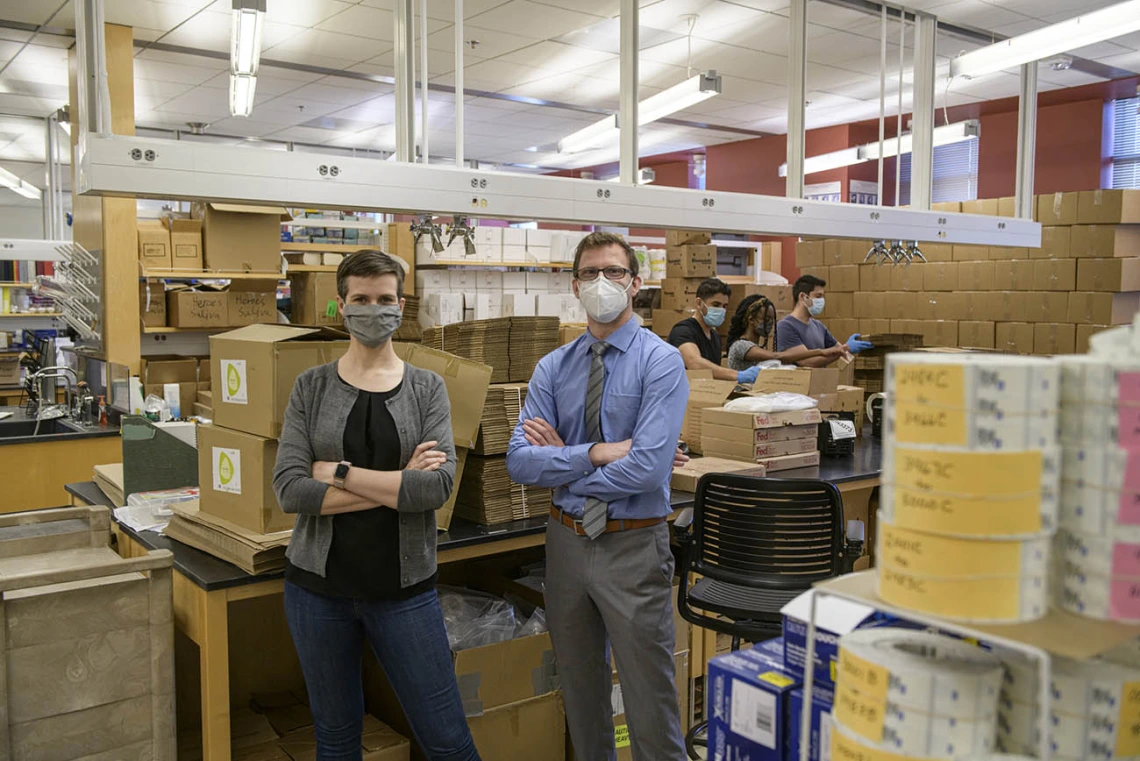 Karen Lutrick, PhD, and Shawn Bietel visited the laboratory where production of the AZ HEROES kits that are mailed to study participants each week takes place. The study was recently funded for a second year through a $15 million grant from the U.S. Centers for Disease Control and Prevention.