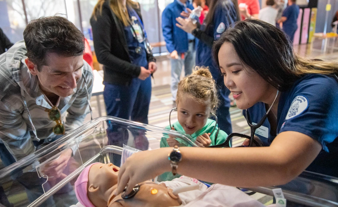 Volunteers from the University of Arizona College of Nursing demonstrate skills.