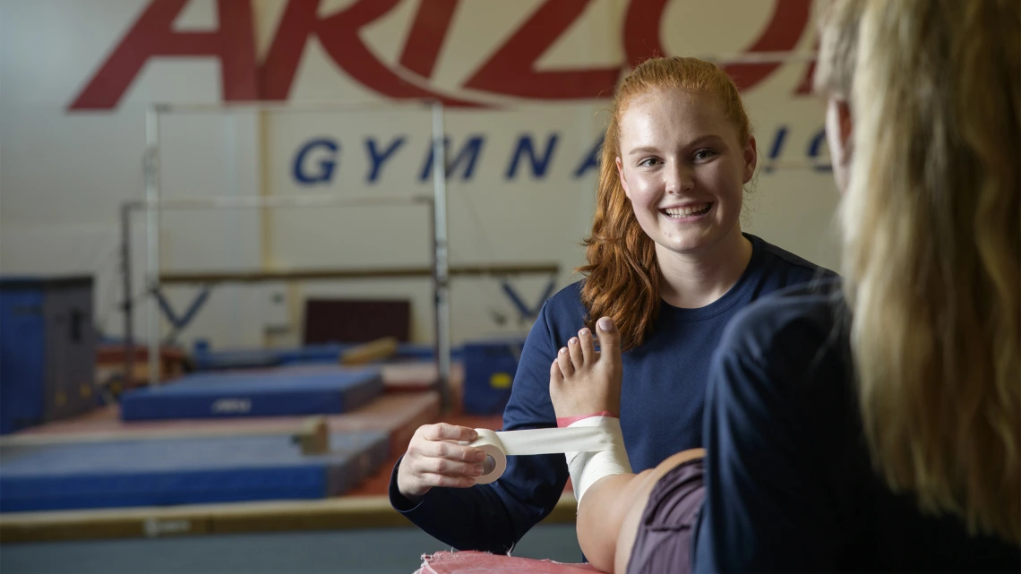 In addition to her role as an undergraduate research assistant, Mikayla Campagne works as an athletic training technician for the UArizona women’s gymnastics team. 