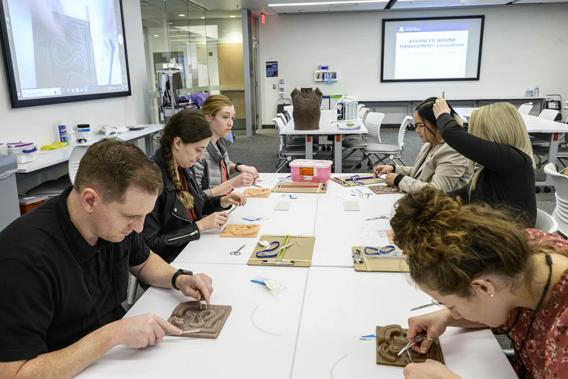 UArizona College of Nursing Doctor of Nursing Practice students try their skills at wound suturing during the first clinical immersion of the year. 