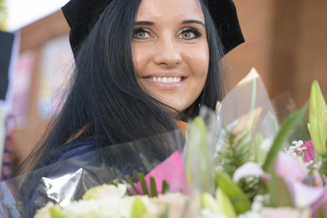 Dragana Vojvodic is all smiles after receiving a Doctor of Nursing Practice degree at the UArizona College of Nursing fall convocation in Centennial Hall on Dec. 15.