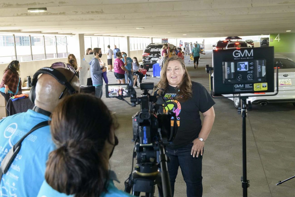 Arizona SciTech Institute’s Chief Operating Officer, Kelly Greene, records a message during the Connect2STEM event that her organization sponsored along with UArizona Health Sciences and Cox Communications.         