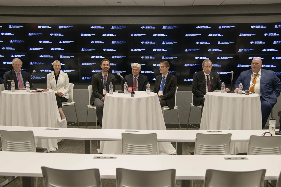 Reporters from several national media outlets logged in to virtually attend a press conference and ask questions about the new partnership. From left: Robert C. Robbins, MD, Kayse Shrum, DO, Todd Vanderah, PhD, Frank Porreca, PhD, Don Kyle, PhD, Michael D. Dake, MD, Johnny Stephens, PharmD.