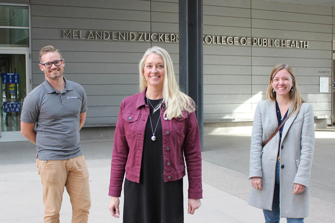 The new round of funding will enable the Western Region Public Health Training Center team, including (from left) online designer Erich Healy, director Kelly Reynolds, PhD, and associate director Abby Stoica, MPH, to continue to provide training to expand the workforce, build skills and services, and enable public health professionals to meet community needs and emerging threats at local, state and national levels.