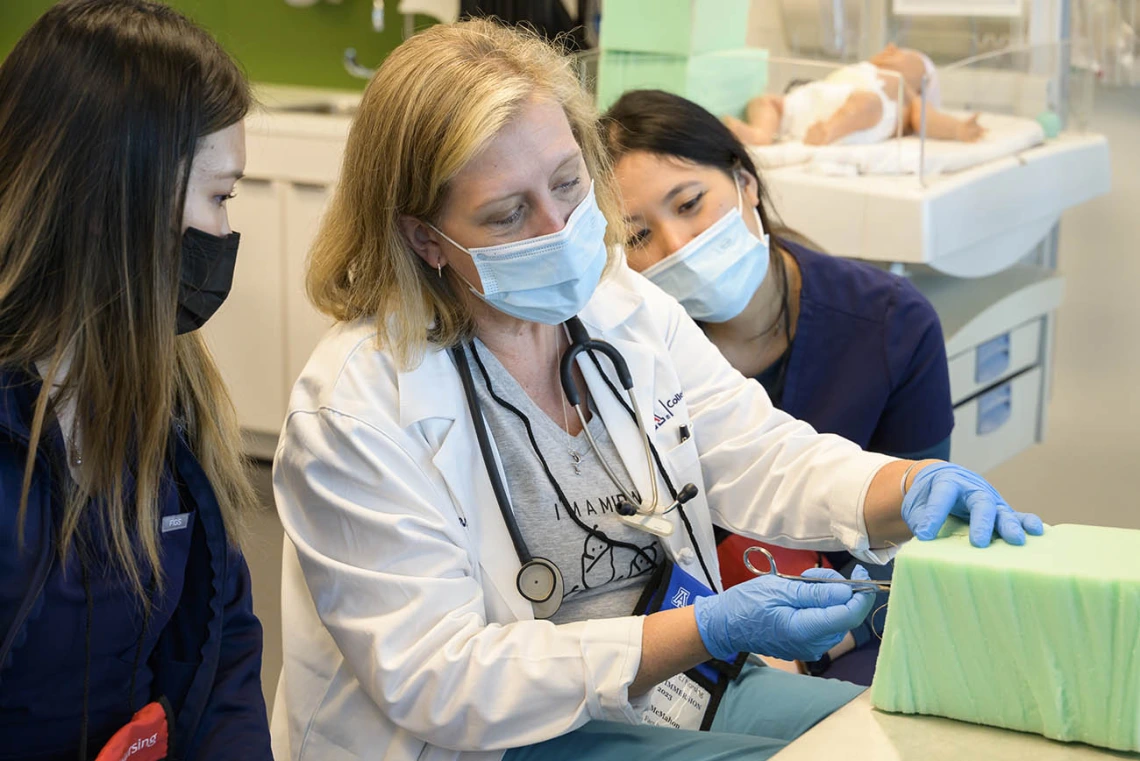 UArizona College of Nursing professor demonstrates suturing techniques for Doctor of Nursing Practice in nurse-midwifery students. 