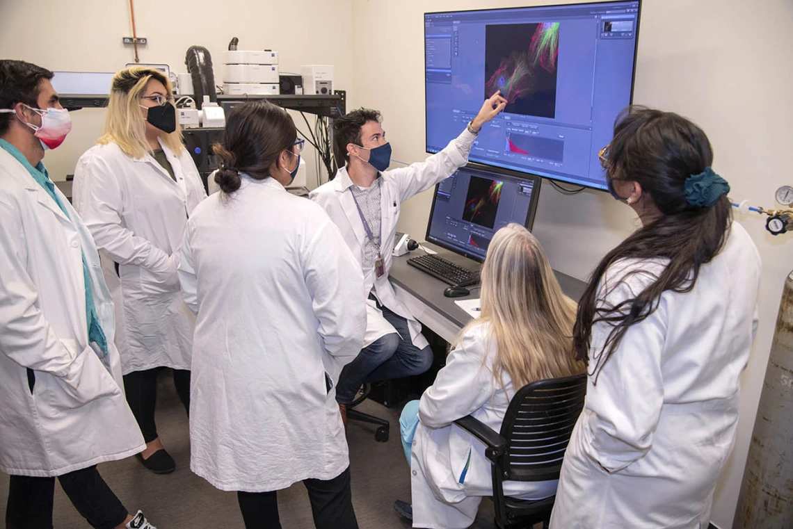 Students worked in labs alongside researchers, engaged in mentor sessions, took part in talking circles and gave presentations on their research findings.