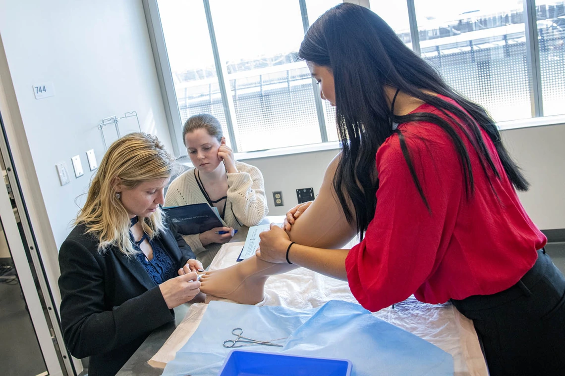 The College of Nursing uses lifelike manikins to practice removing toenails.