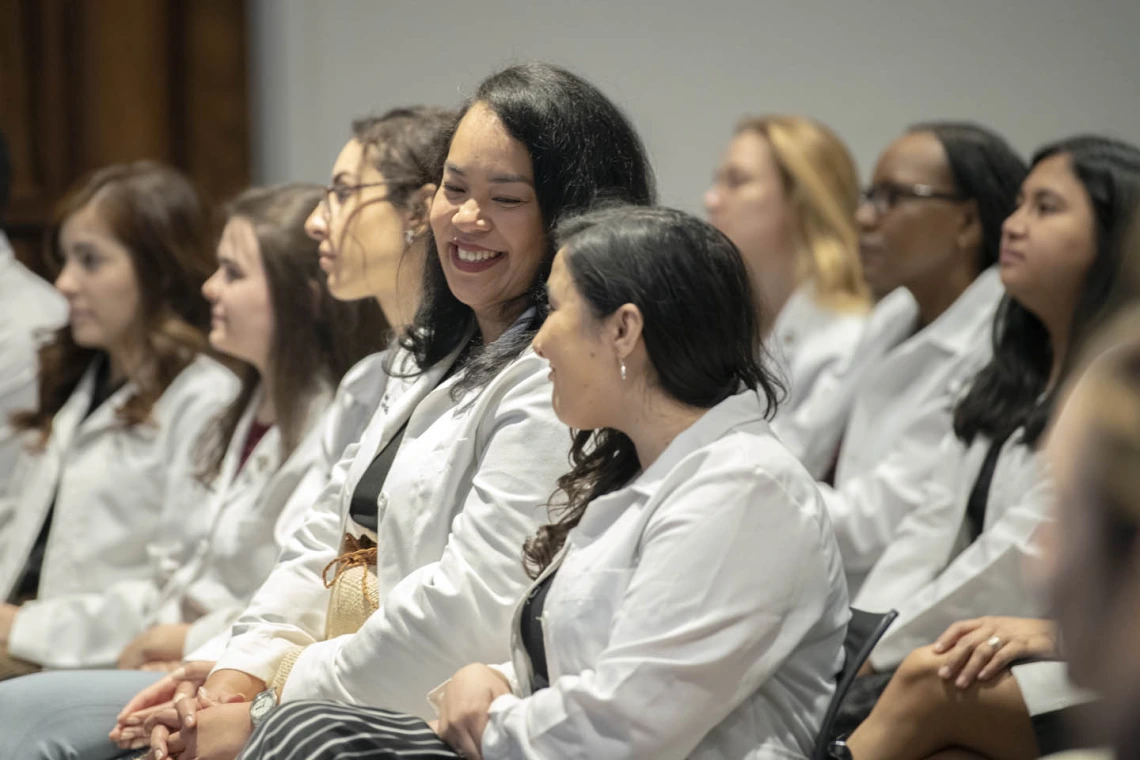 Primary Care Physician scholarship recipient Kaloni Philipp shares a moment with fellow scholarship recipient Anna Ressel.