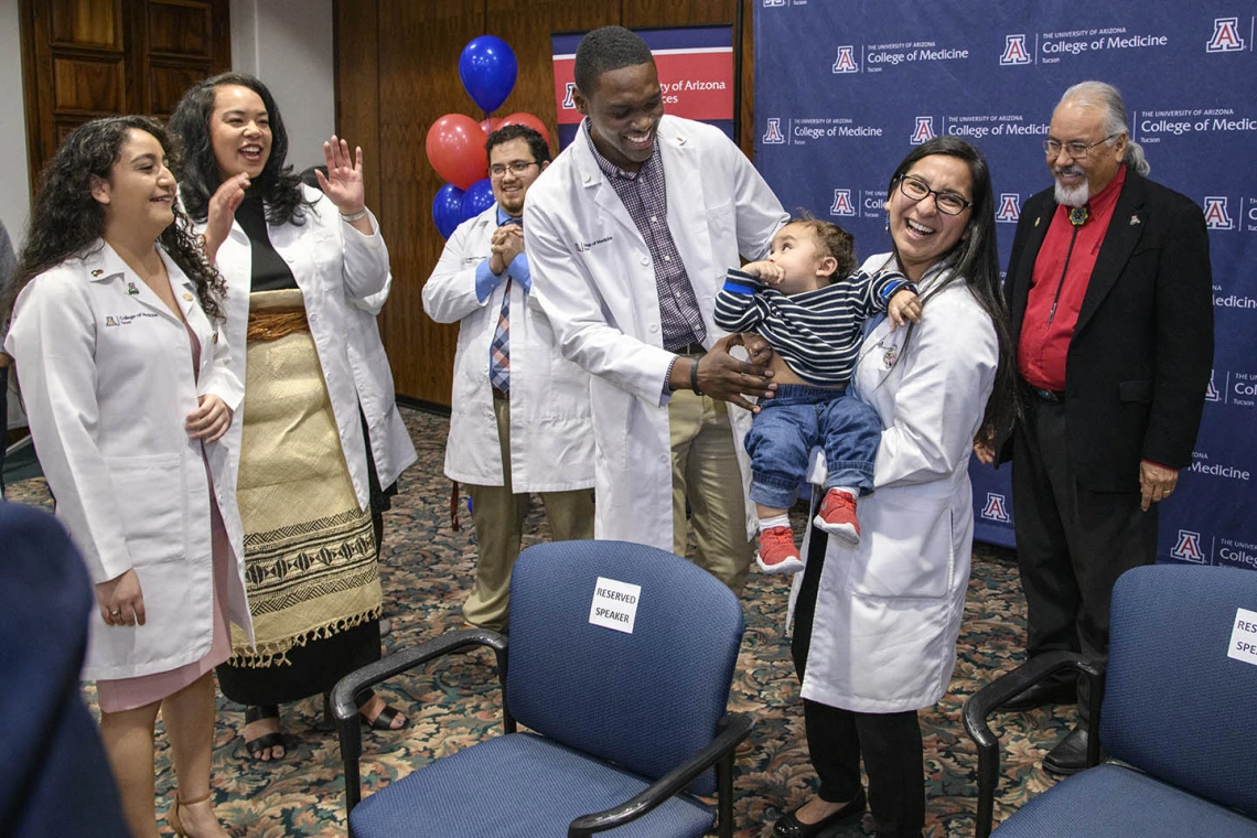 Primary Care Physician scholarship recipients celebrate the announcement of their scholarships.