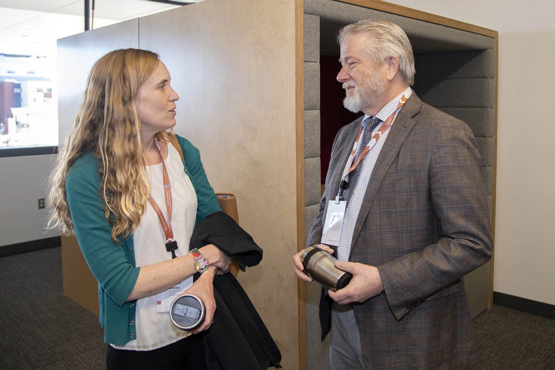 Daniel Derkson, MD, director of the Arizona Center for Rural Health, speaks to faculty member at FC+A grand opening event.