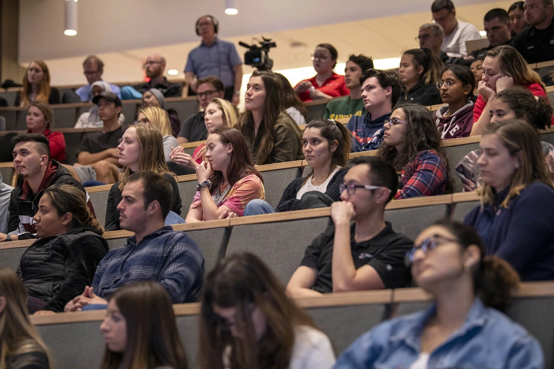 Students listen to Drug Survival 102 panelists speak about the response to the opioid overdose crisis. 