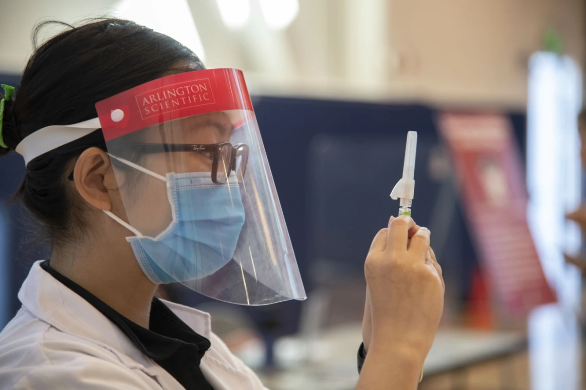 PharmD student Lisa Le was one of dozens of pharmacy and nursing students who administered immunizations at a campus flu shot clinic.