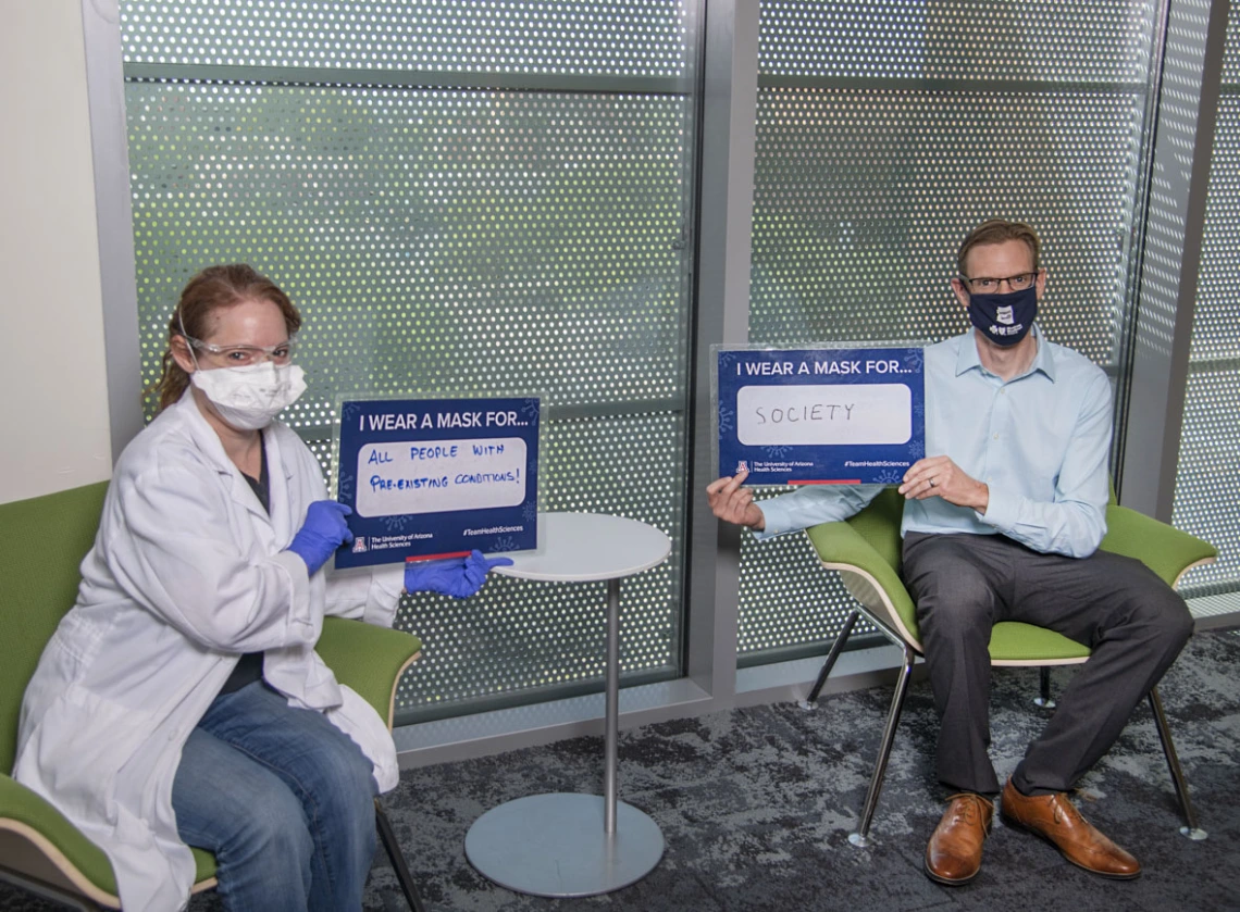 Mandi Corenblum, MS, lab manager and research specialist, and Mark Drew, PhD, translational project manager at the Center for Innovation in Brain Science.