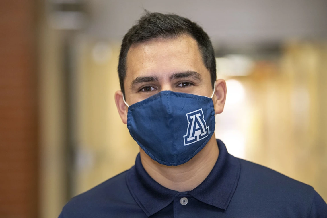 First-year College of Medicine – Tucson student Andres F. Diaz wears a mask for the immunocompromised, especially kids.