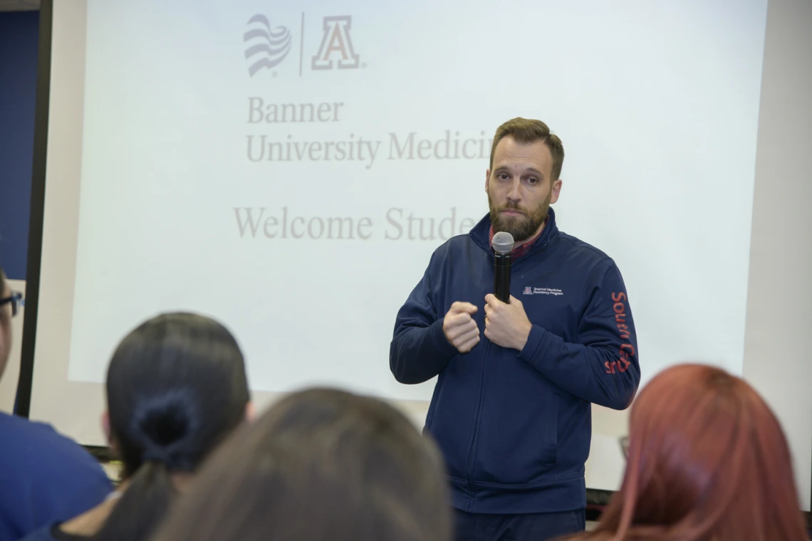 Nicholas Blackstone speaks to students before participants break into tours.