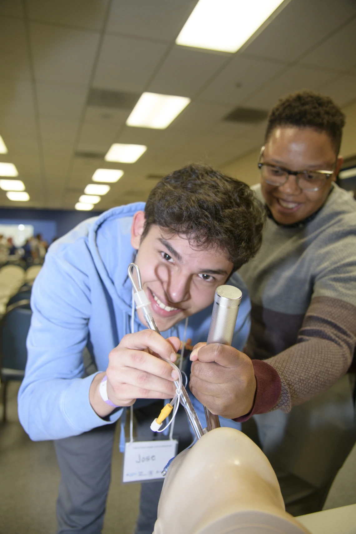 An anesthesiology specialist gives a demonstration on intubation.