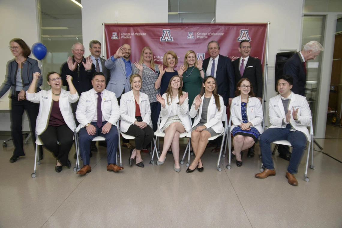 A group photo of Primary Care Physician scholarship recipients, University of Arizona staff and community members.