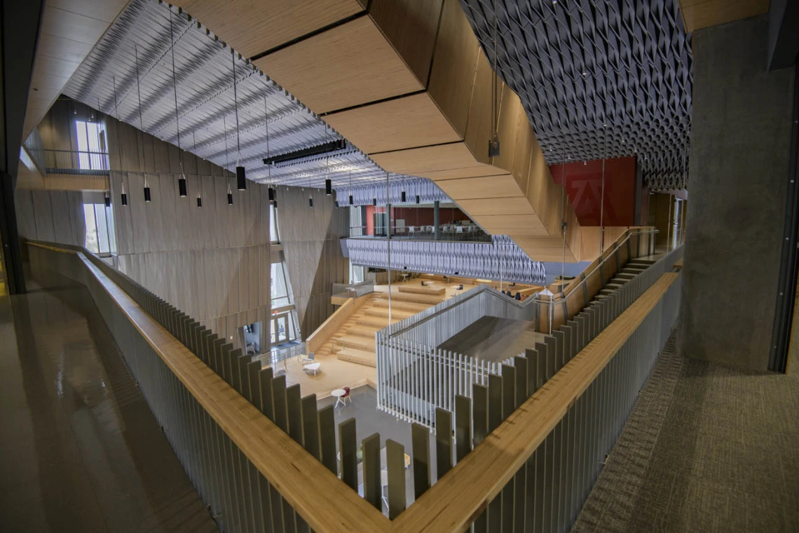 Looking down at The Forum from the second floor, no vertical columns obstruct the view. The staircase on the west side of the building allows easy access to upper floors, and is designed to discourage elevator use.